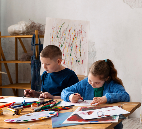 Children drawing and collaborating happily